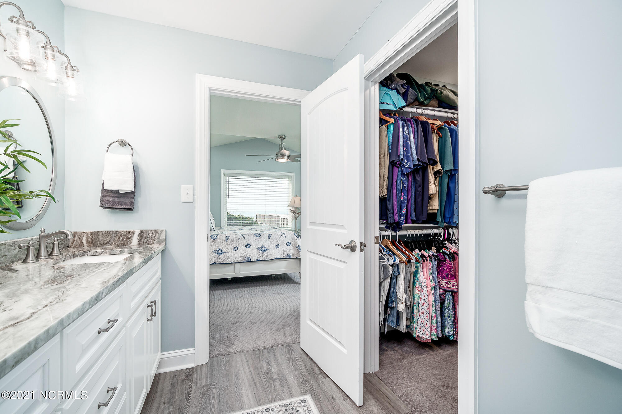 703 Salter Path Road Indian Beach, NC 28512 - Photo 23 of 62 Primary bathroom and walk-in closet