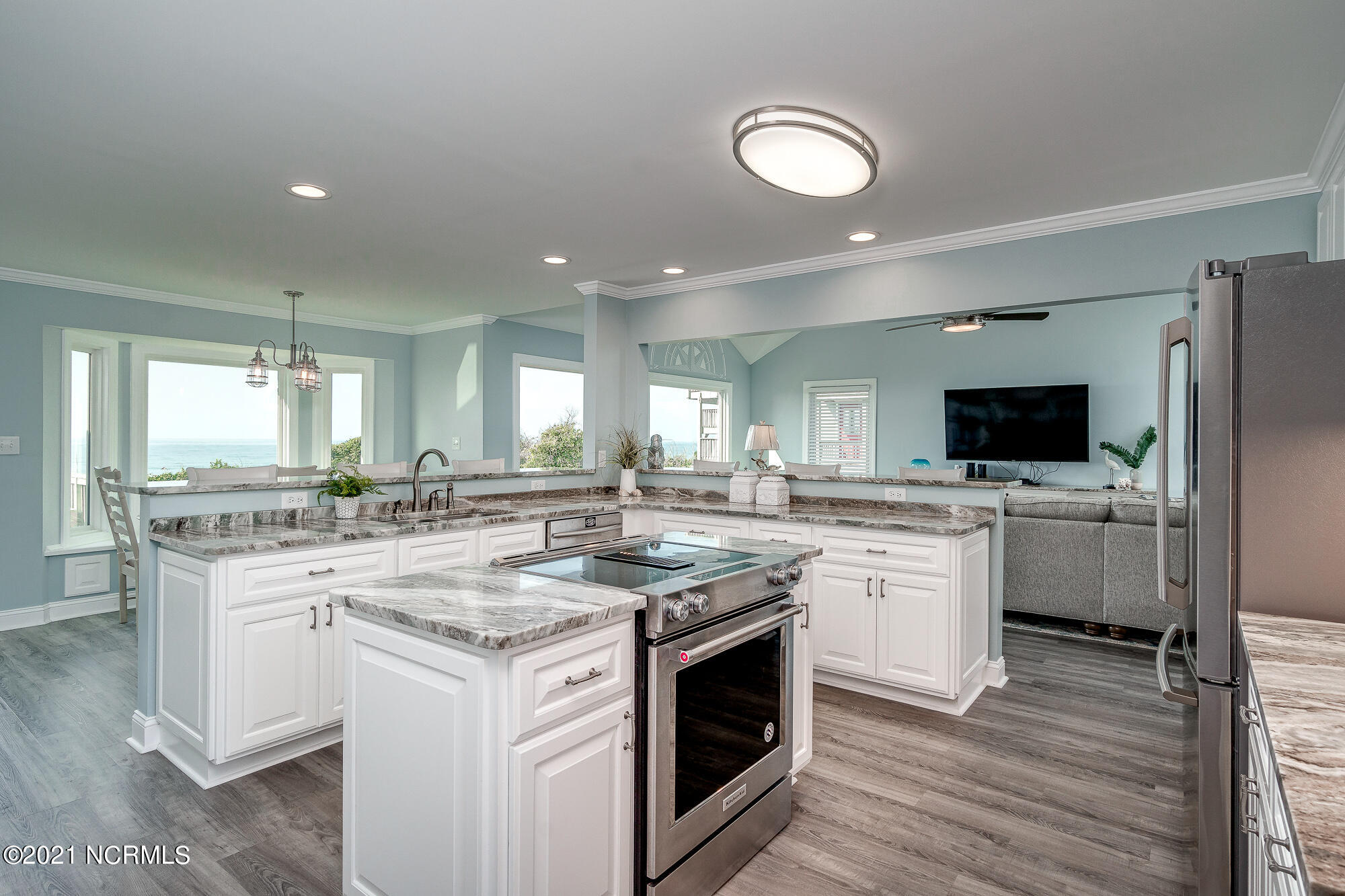 703 Salter Path Road Indian Beach, NC 28512 - Photo 4 of 62 Kitchen w/ island and peninsula seating