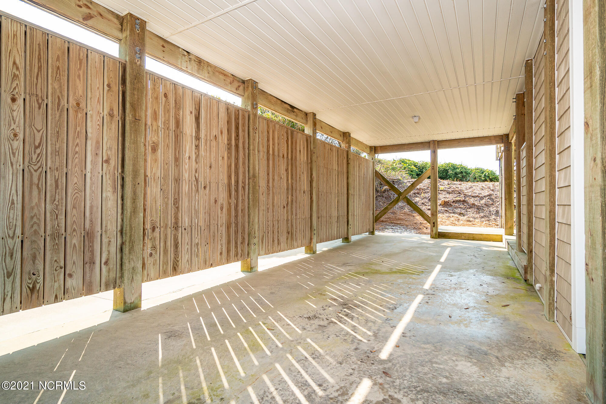 703 Salter Path Road Indian Beach, NC 28512 - Photo 45 of 62 Carport under house