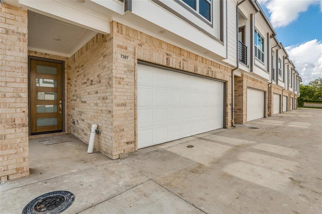 7307 Rubio Place Dallas, TX 75235 - Photo 3 of 17 a view of a street with building