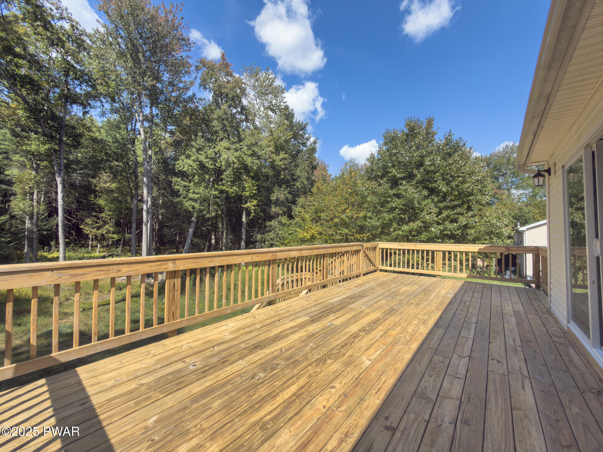 153 Hatton Road Hawley, PA 18428 - Photo 36 of 38 a view of balcony with wooden floor and fence