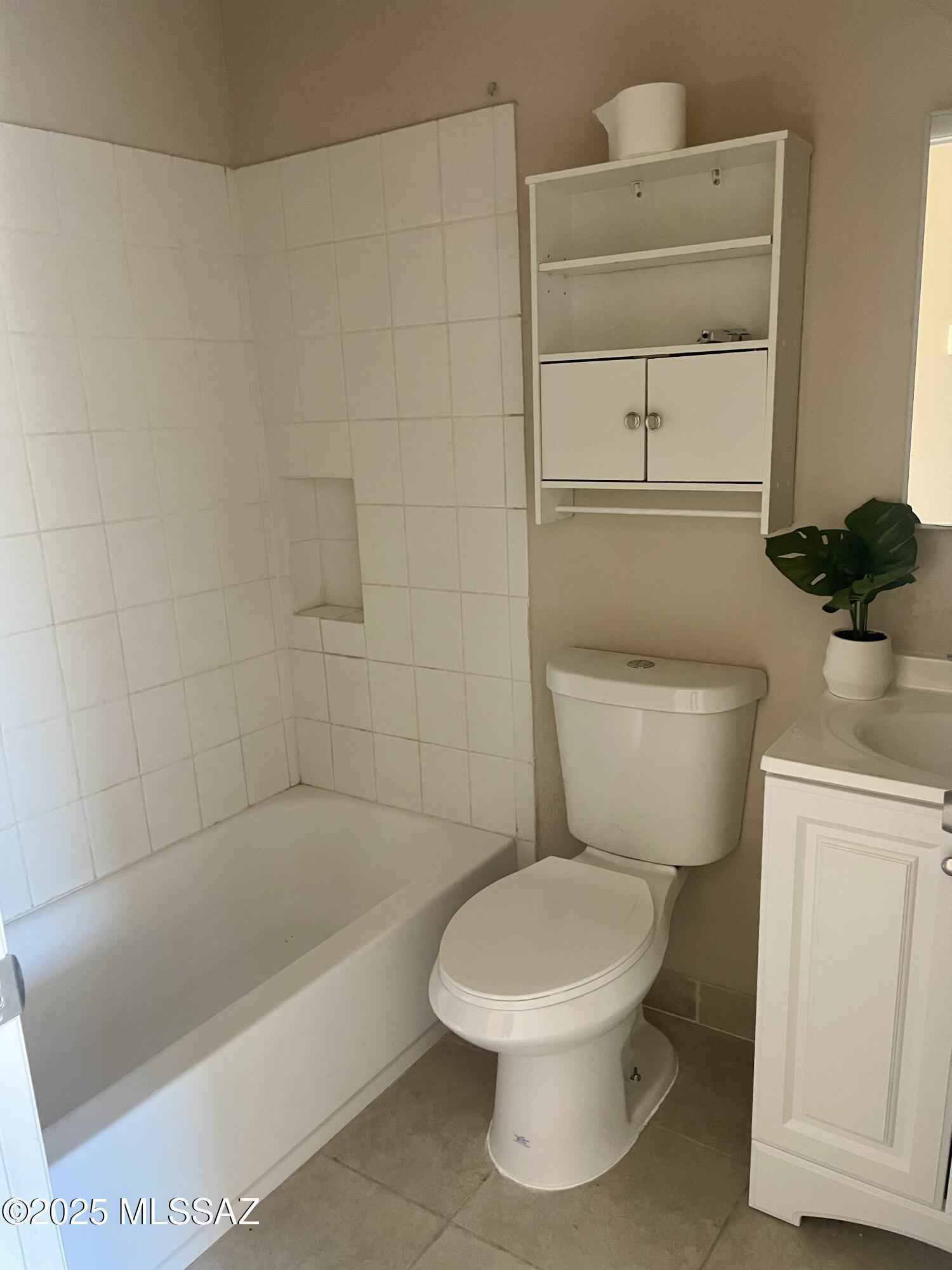 1503 Camino Bacalao Rio Rico, AZ 85648 - Photo 40 of 43 a white toilet sitting next to a bathtub