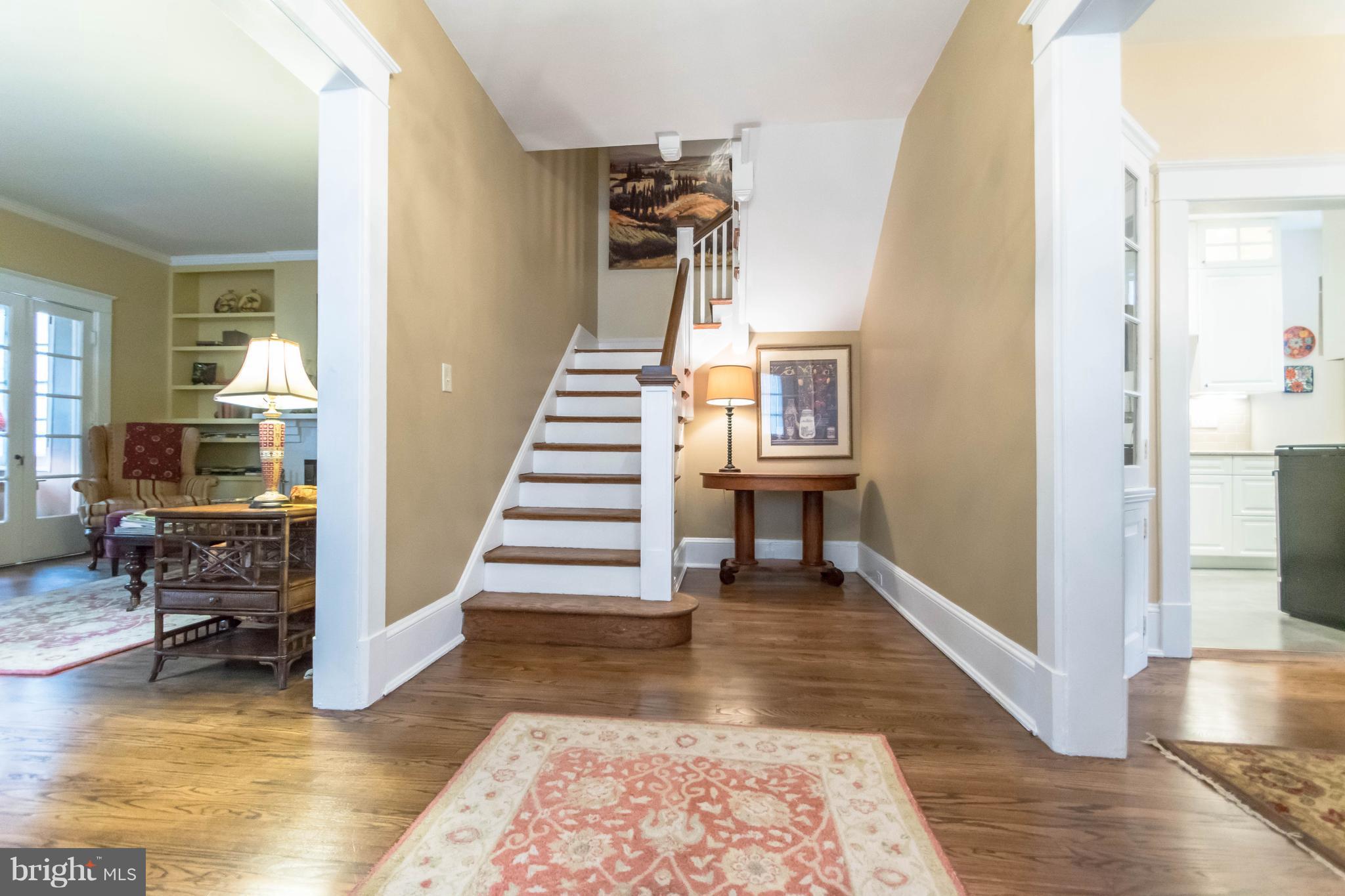 4105 Roland Avenue Baltimore, MD 21211 - Photo 3 of 28 a view of entryway and hall with wooden floor