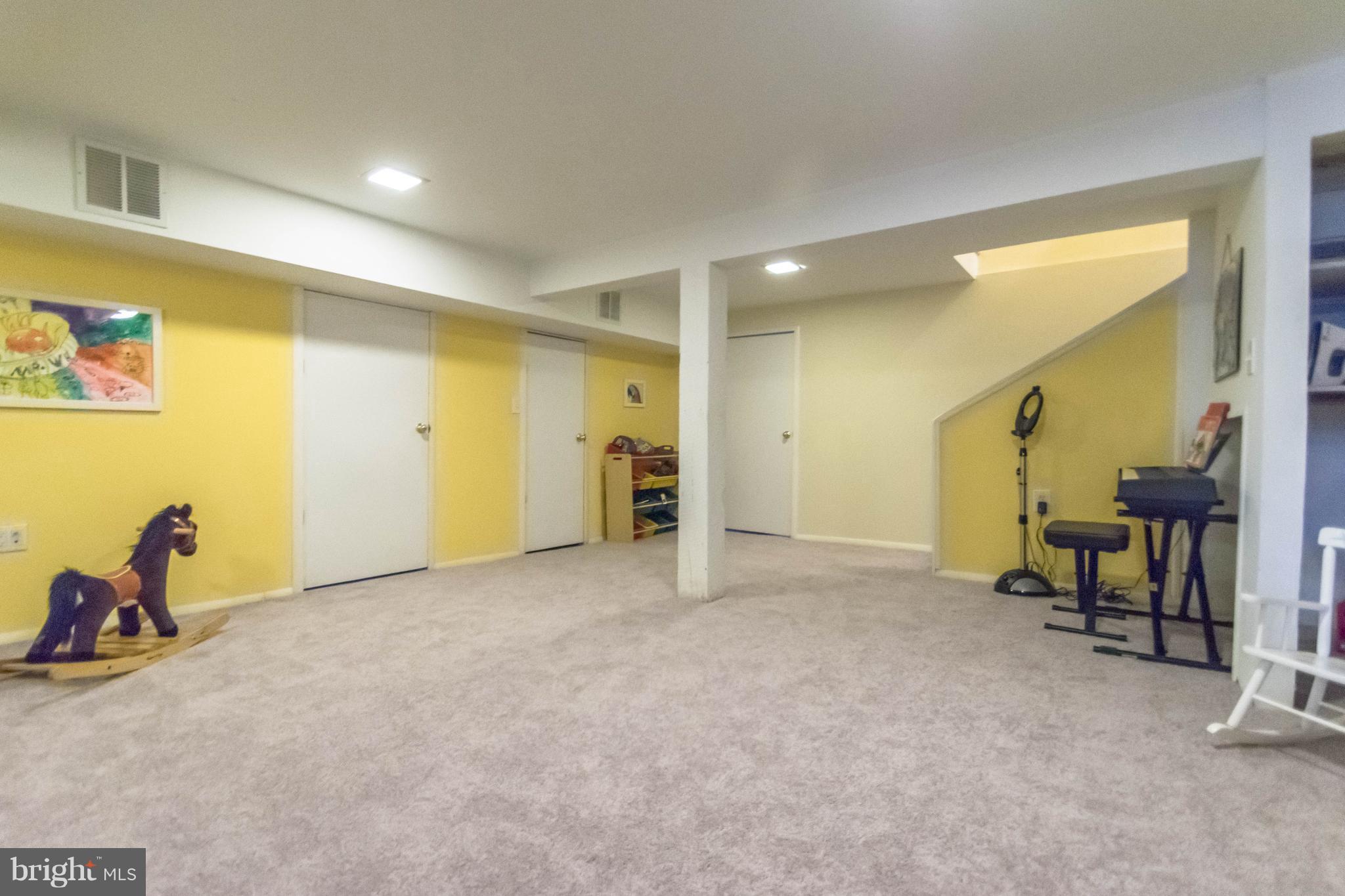 4105 Roland Avenue Baltimore, MD 21211 - Photo 22 of 28 a view of a room with gym equipment