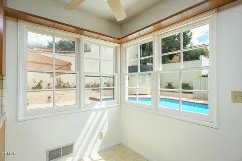 a view of a room with a large window