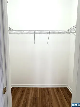 a bathroom with a toilet a sink and a shower