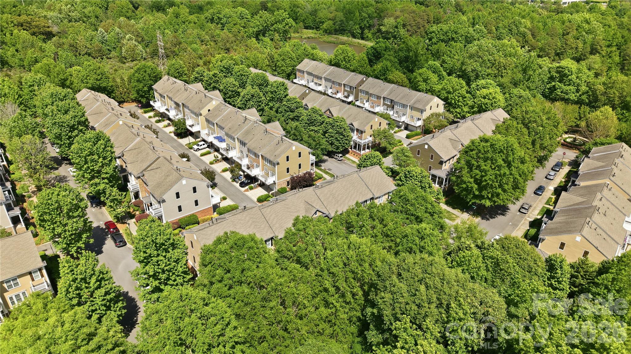 645 6th Baxter Crossing Fort Mill, SC 29708 - Photo 28 of 32 an aerial view of residential houses with outdoor space