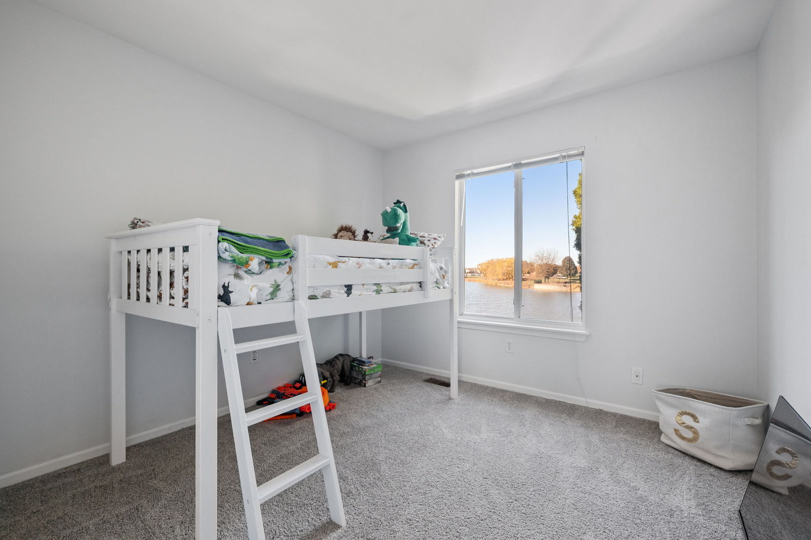 14058 South Hemingway Circle Plainfield, IL 60544 - Photo 11 of 23 a bedroom with a bed and a window