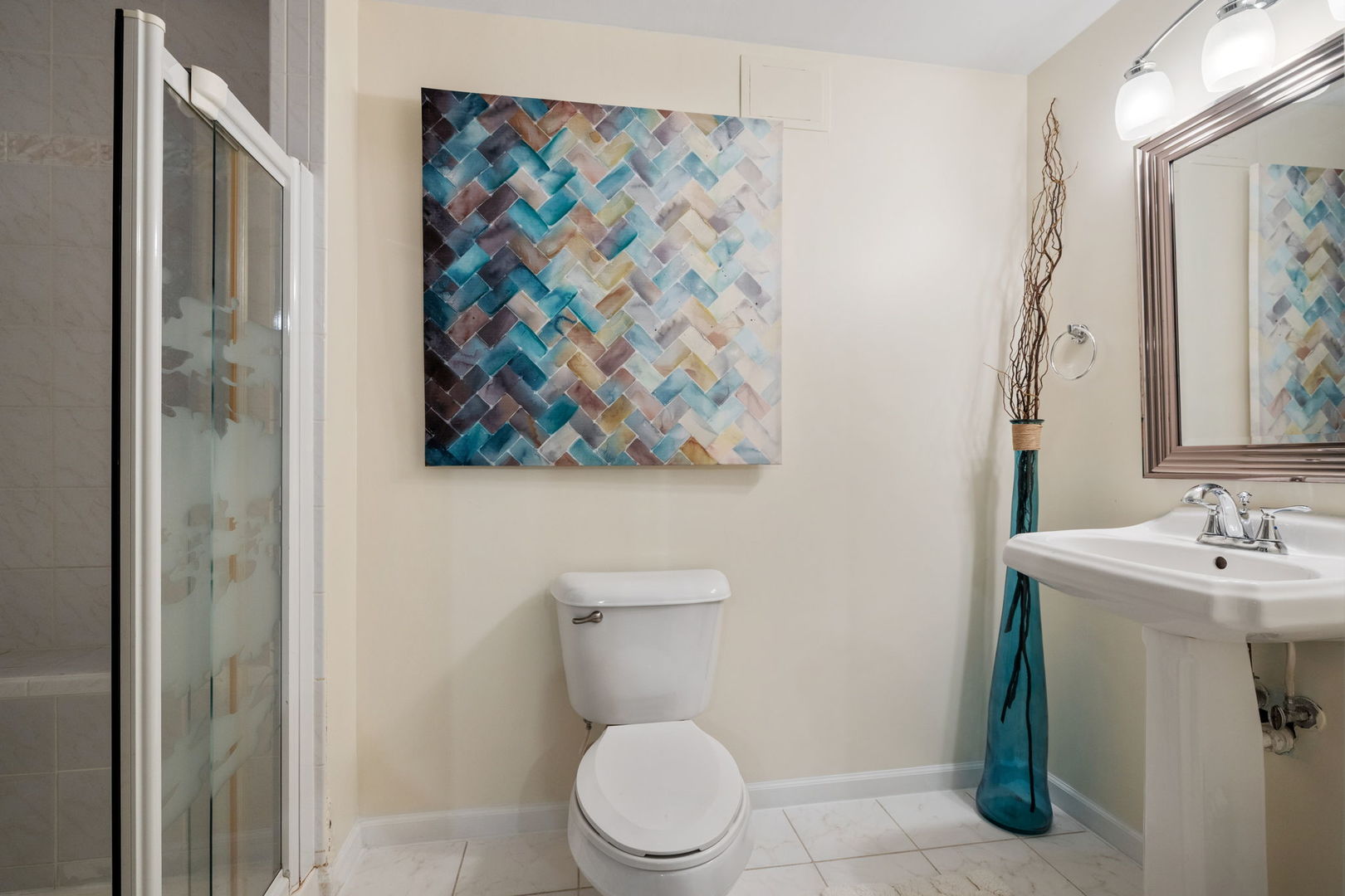 14058 South Hemingway Circle Plainfield, IL 60544 - Photo 16 of 23 a bathroom with a toilet a sink and a mirror