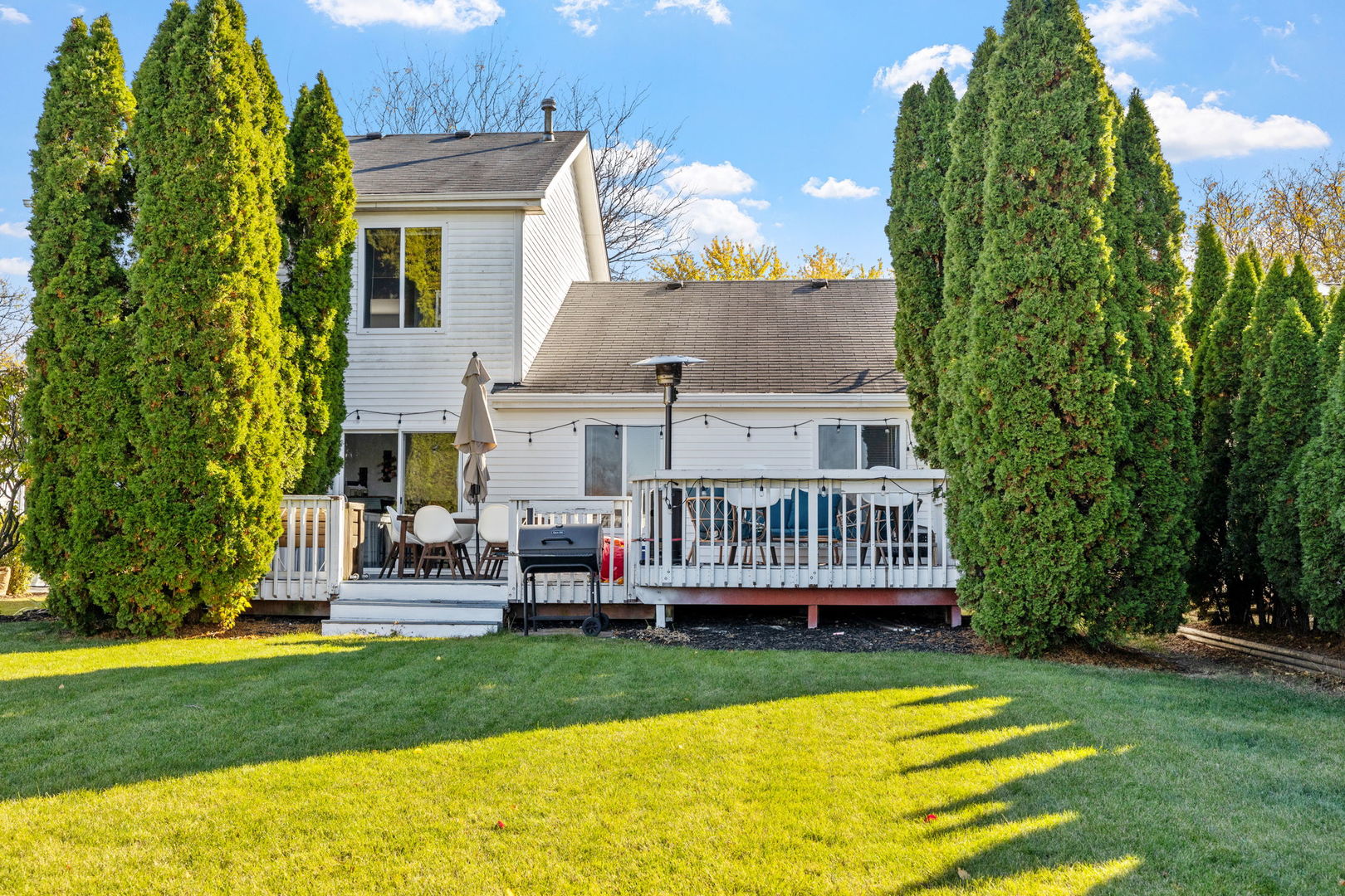 14058 South Hemingway Circle Plainfield, IL 60544 - Photo 20 of 23 a view of a house with a yard