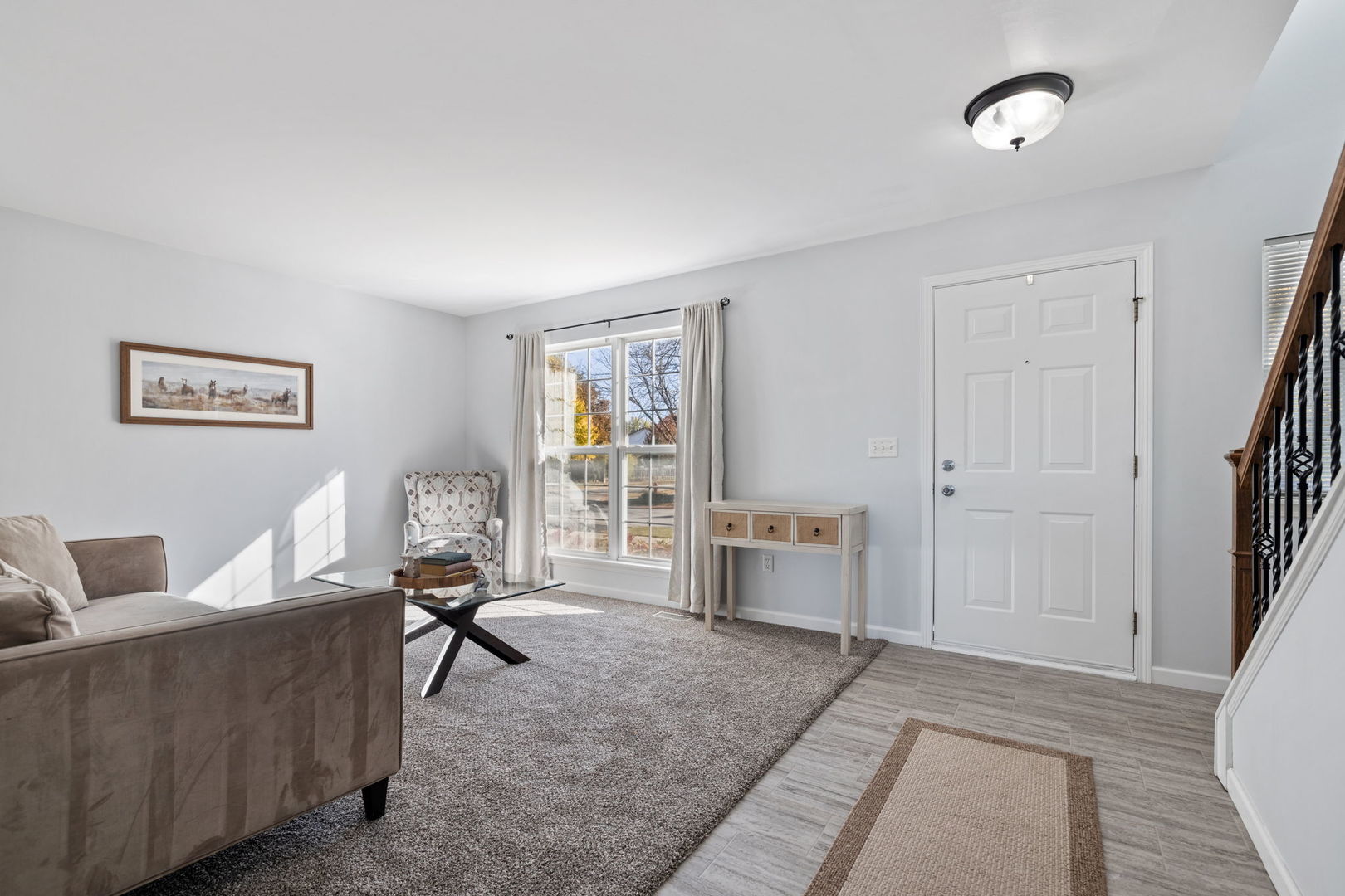 14058 South Hemingway Circle Plainfield, IL 60544 - Photo 3 of 23 a living room with furniture and a window