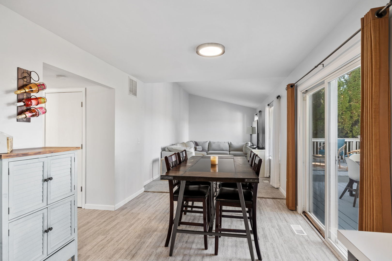 14058 South Hemingway Circle Plainfield, IL 60544 - Photo 5 of 23 a view of a dining room with furniture window and wooden floor