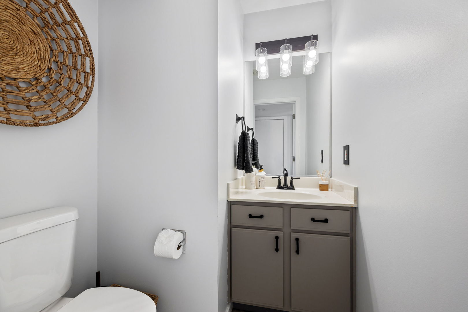 14058 South Hemingway Circle Plainfield, IL 60544 - Photo 9 of 23 a bathroom with a toilet a sink and mirror