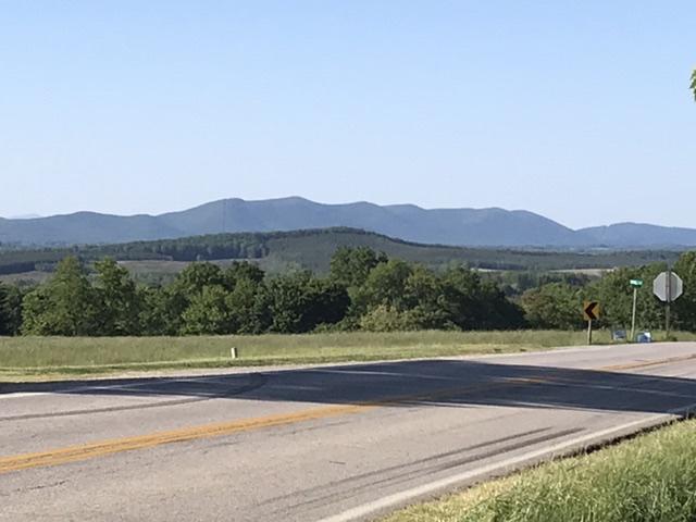 a view of a house and a yard
