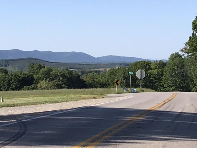 3298 Sago Road Callands, VA 24530 - Photo 2 of 15 a wooden floor with a lake view
