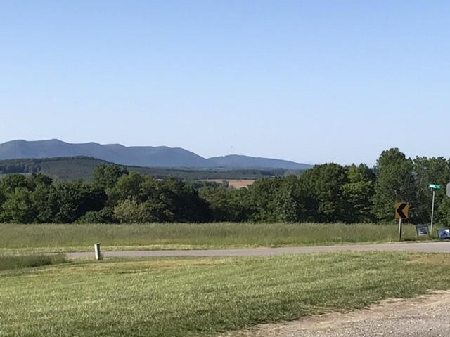 3298 Sago Road Callands, VA 24530 - Photo 5 of 15 a view of a grassy area with an ocean