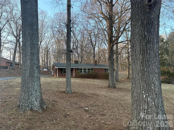 front view of a house with a trees