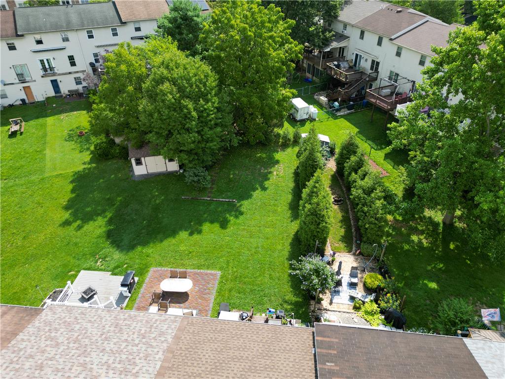 257 Ridgeview Drive Alburtis, PA 18011 - Photo 20 of 24 An aerial perspective reveals a vast green yard, complete with a garden shed and ample outdoor living spaces.