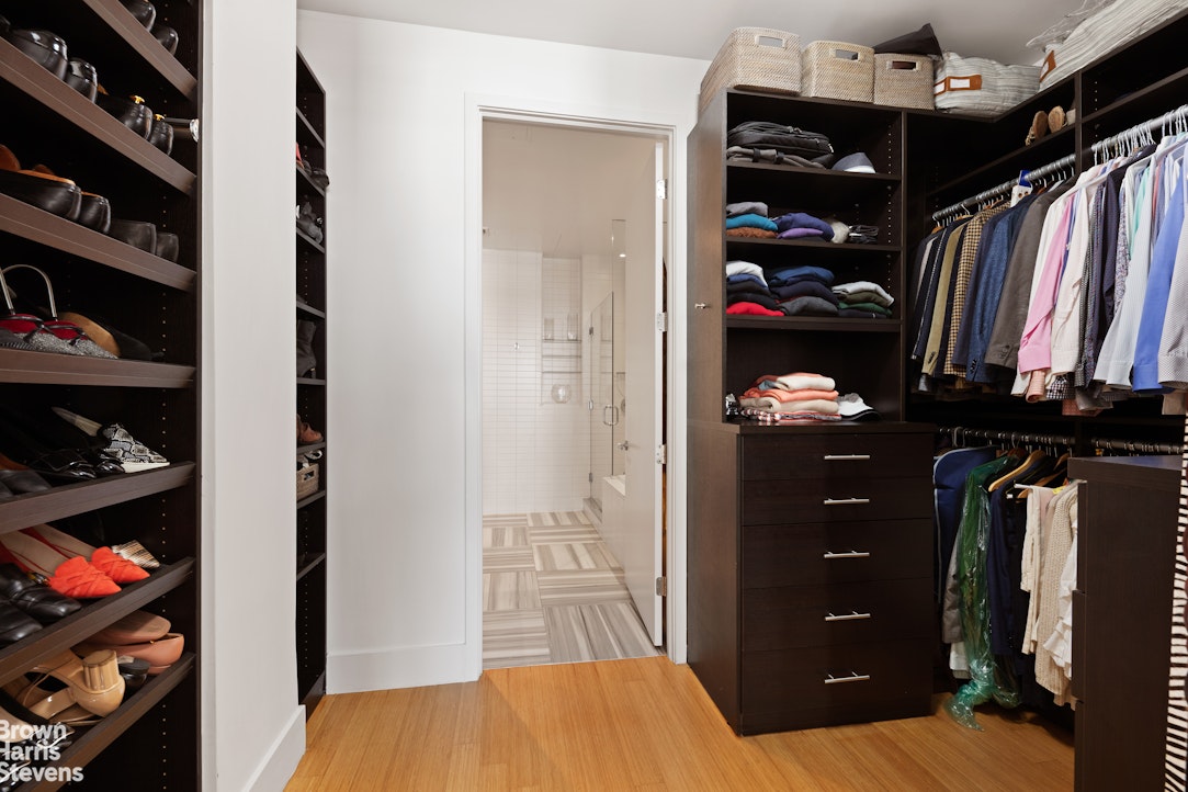 140 West 124th Street, Unit 8A Manhattan, NY 10027 - Photo 7 of 16 a bedroom with a bed and a walk in closet