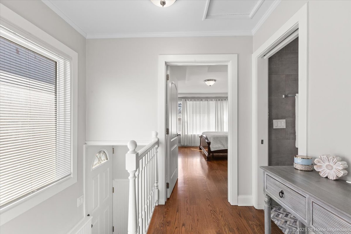 411 Herrick Road Riverside, IL 60546 - Photo 13 of 37 a hall way with closet and a mirror