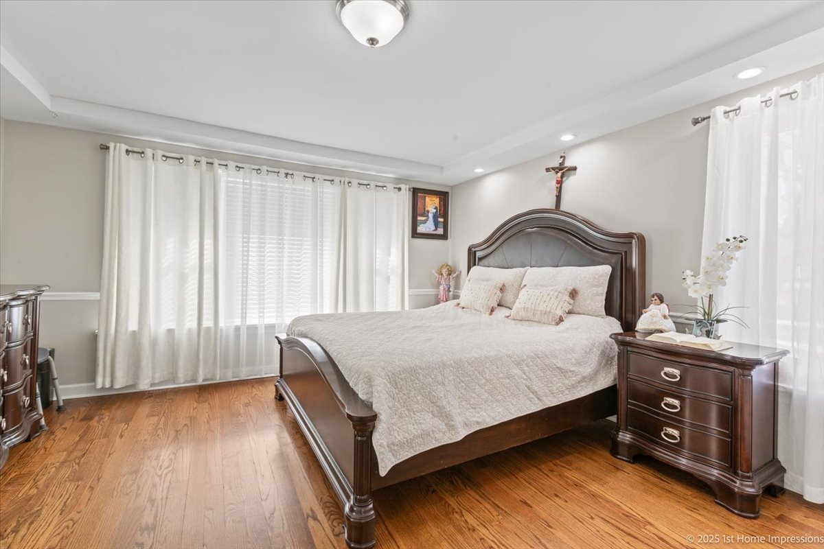 411 Herrick Road Riverside, IL 60546 - Photo 17 of 37 a bedroom with a bed and a window
