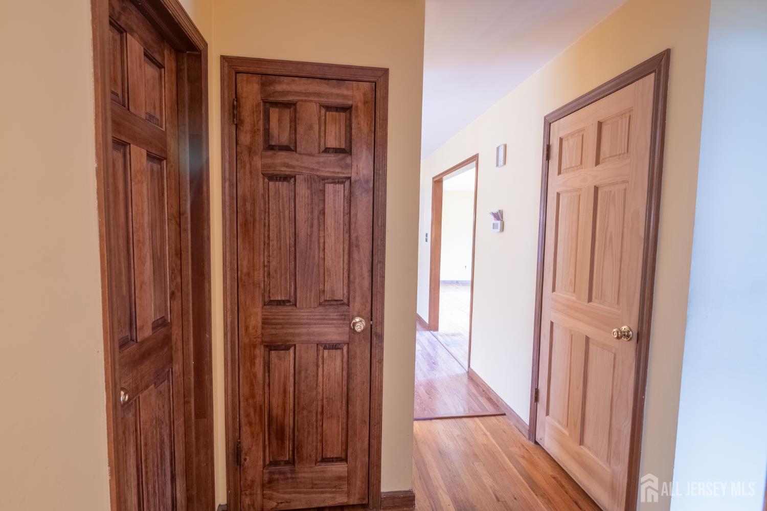 12 Francis Road East Brunswick, NJ 08816 - Photo 27 of 66 a view of front door with wooden floor