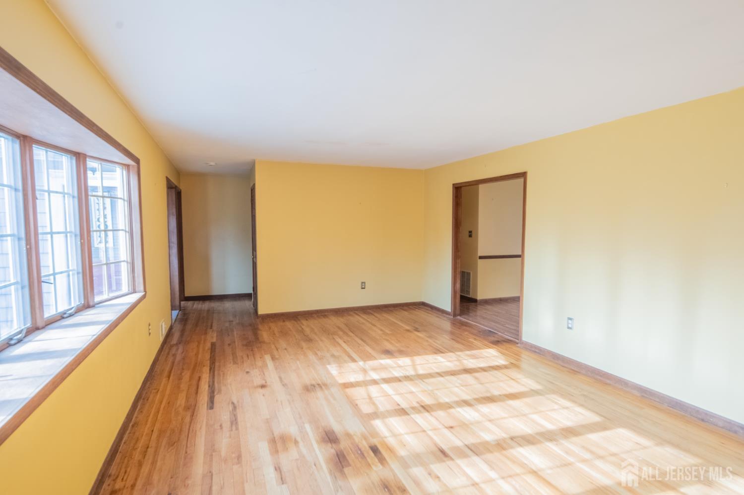 12 Francis Road East Brunswick, NJ 08816 - Photo 3 of 66 a view of an empty room and window