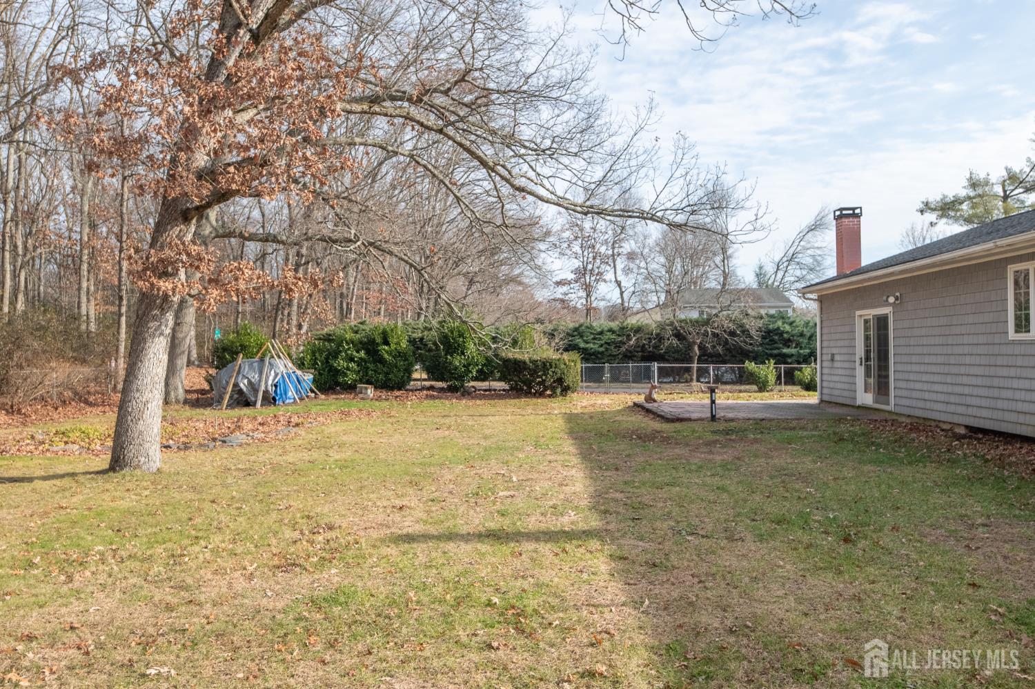 12 Francis Road East Brunswick, NJ 08816 - Photo 60 of 66 a backyard of a house with lots of green space