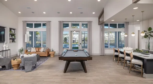 a living room with furniture rug and window
