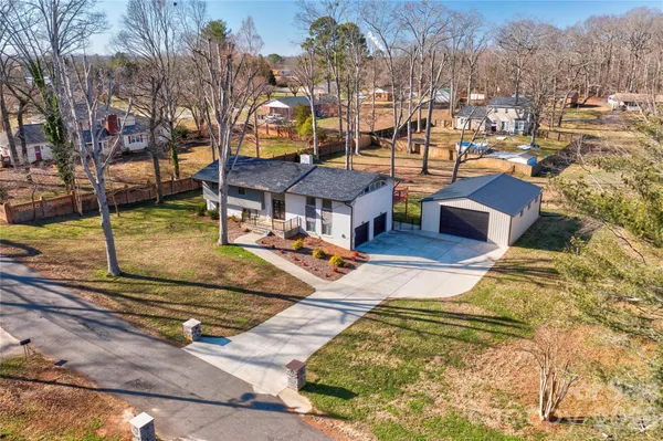 a view of a swimming pool with a lounge chairs