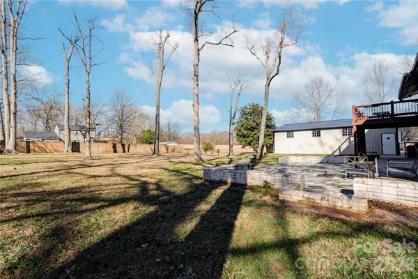 a view of a backyard of the house