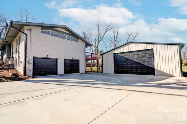 a front view of a house with a garage