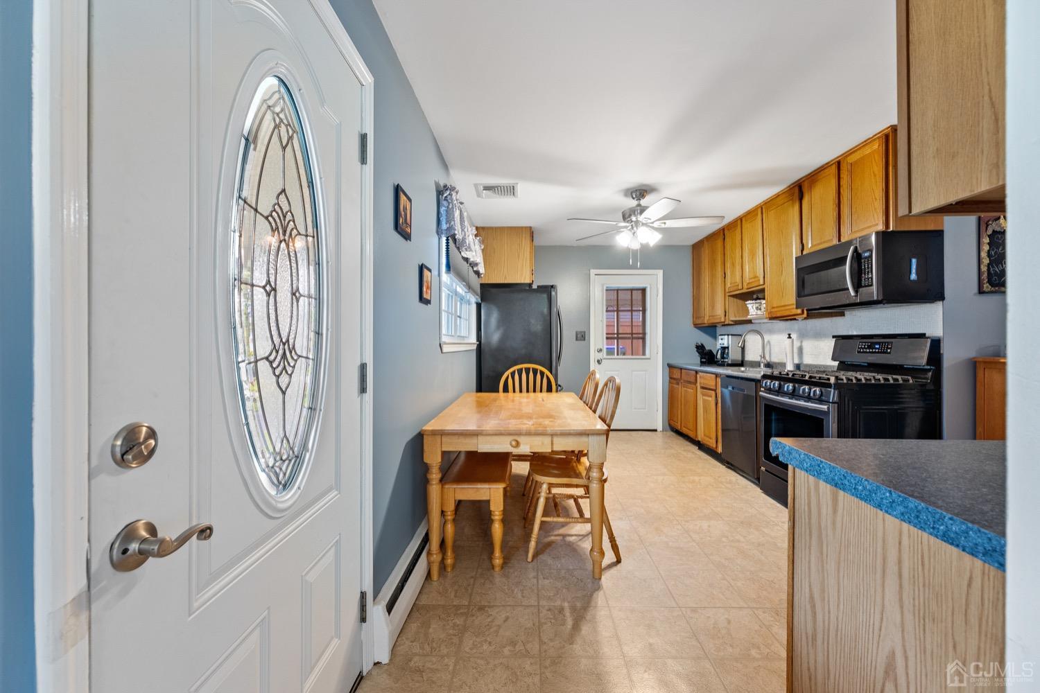 105 Winthrop Road Edison, NJ 08817 - Photo 7 of 33 a kitchen with stainless steel appliances granite countertop a refrigerator and a sink