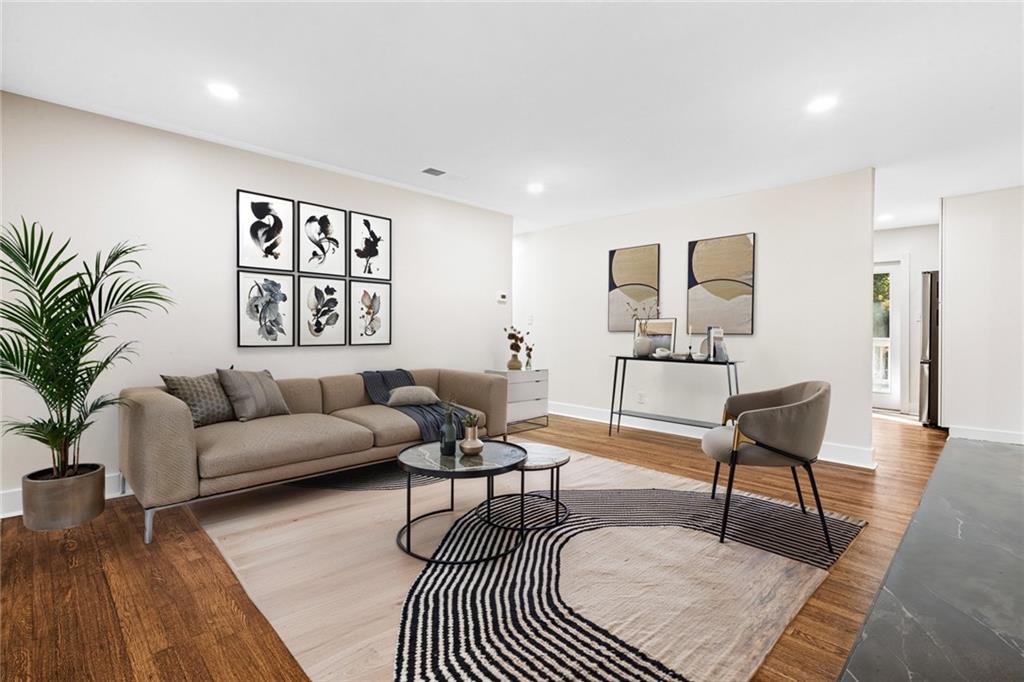 4976 Mable Lake Drive Southwest Mableton, GA 30126 - Photo 8 of 18 a living room with furniture and a rug