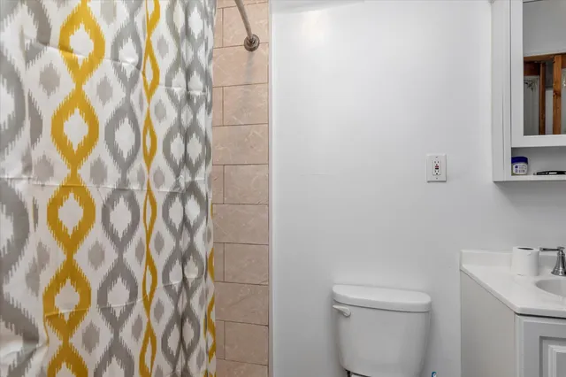 a bathroom with a sink and a toilet