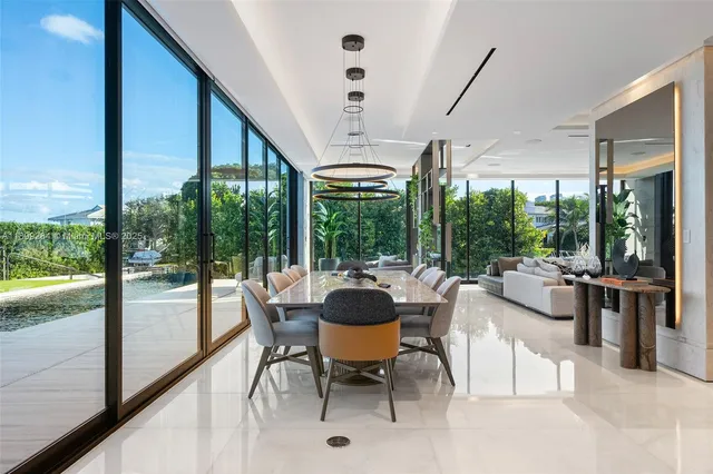 a bathroom with a double vanity sink mirror and shower