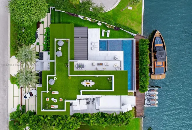 a view of living room with furniture and floor to ceiling window