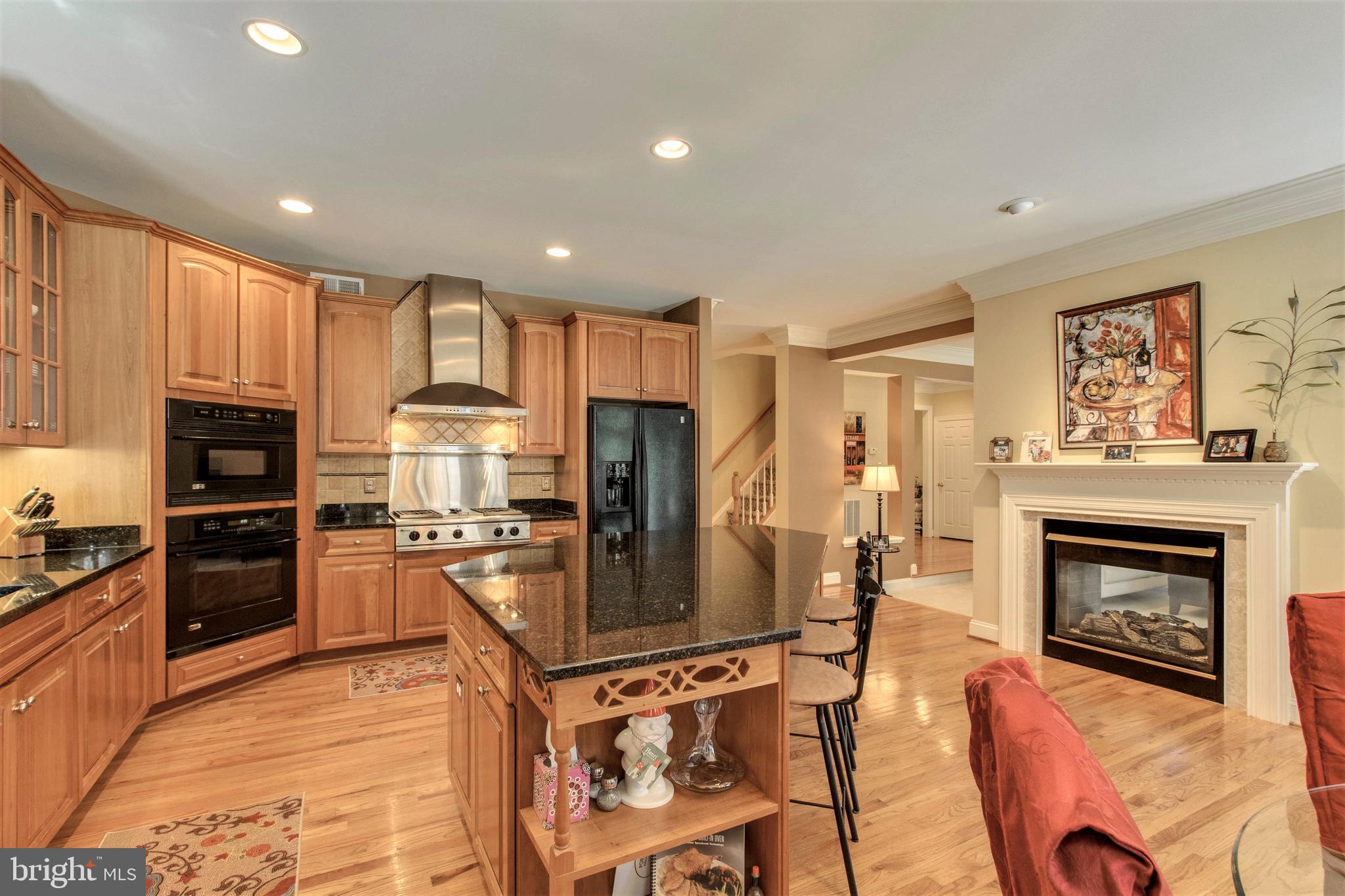 8314 Roxborough Loop Gainesville, VA 20155 - Photo 19 of 93 2-Sided Gas Fireplace