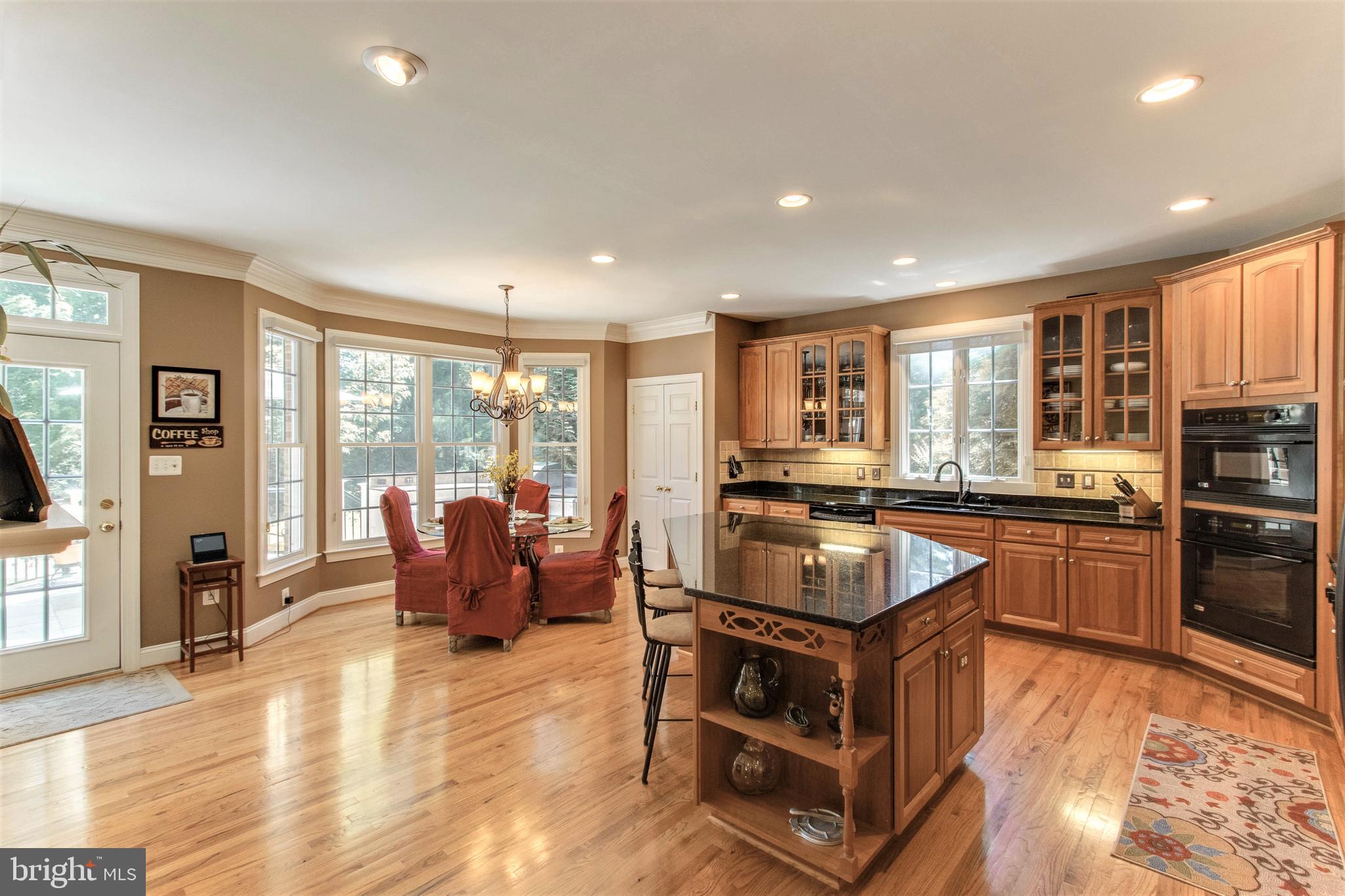 8314 Roxborough Loop Gainesville, VA 20155 - Photo 20 of 93 Bay Window Table Space & Door to Deck