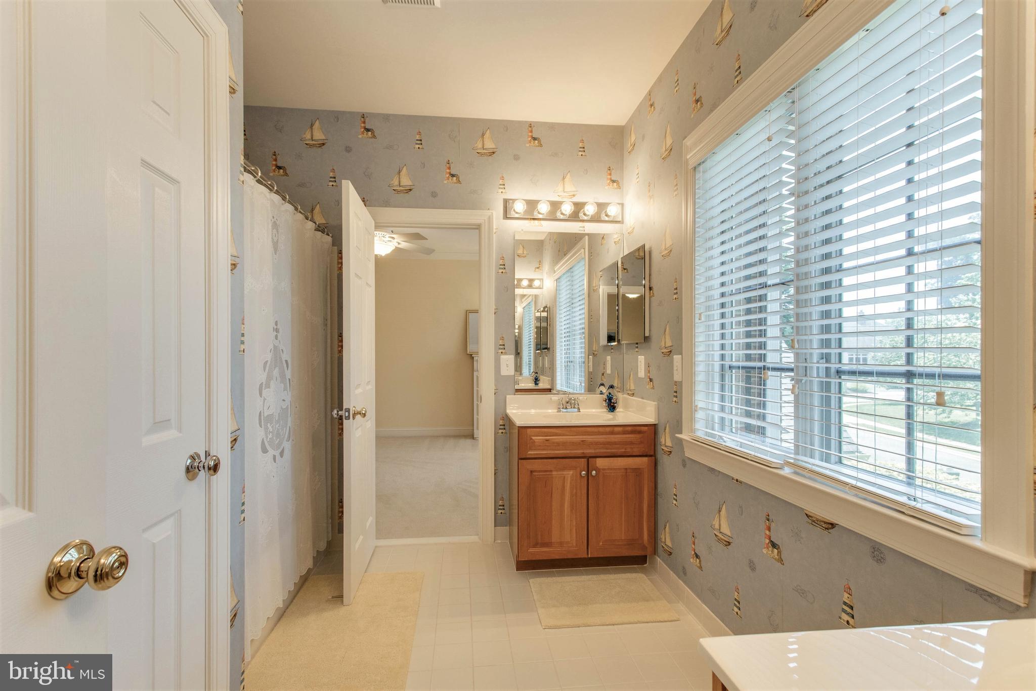 8314 Roxborough Loop Gainesville, VA 20155 - Photo 48 of 93 Tiled Flooring & Tub Surround