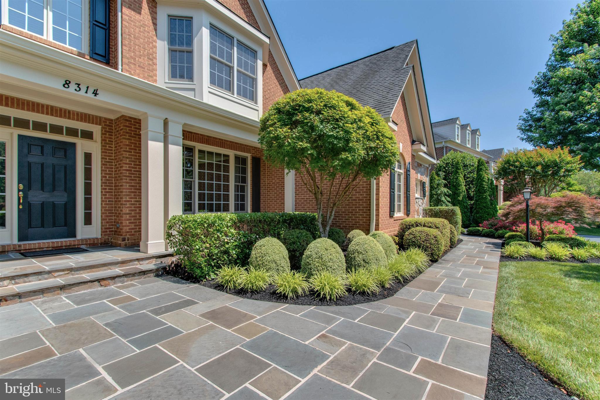 8314 Roxborough Loop Gainesville, VA 20155 - Photo 6 of 93 Custom Stone Front Walk & Covered Porch