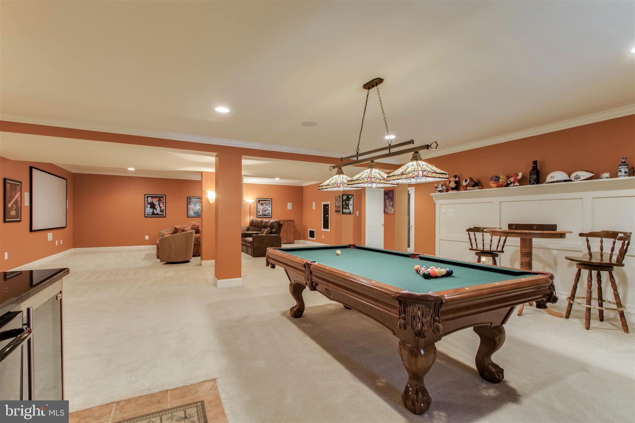 8314 Roxborough Loop Gainesville, VA 20155 - Photo 57 of 93 Pool Table, Bar Table & Stools convey