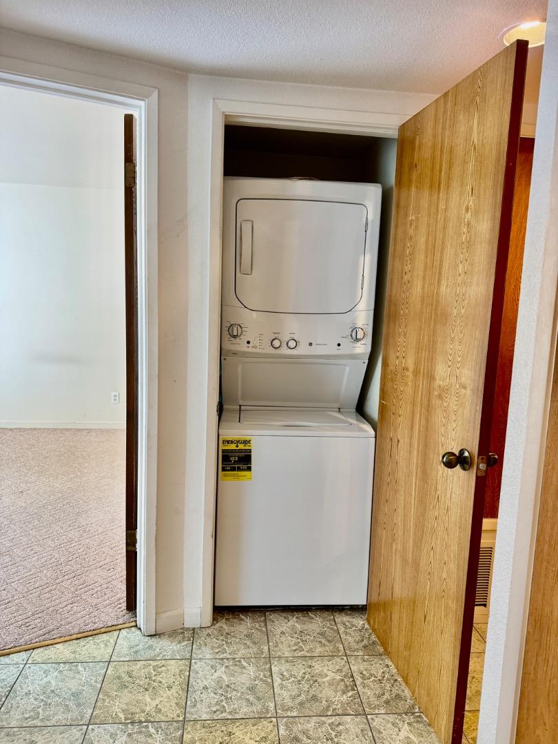 460 Pine Avenue Half Moon Bay, CA 94019 - Photo 12 of 21 a utility room with wooden floor washer and dryer