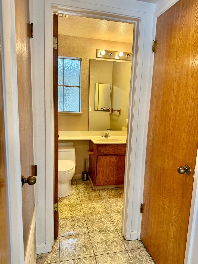 460 Pine Avenue Half Moon Bay, CA 94019 - Photo 14 of 21 a bathroom with a tub sink and toilet