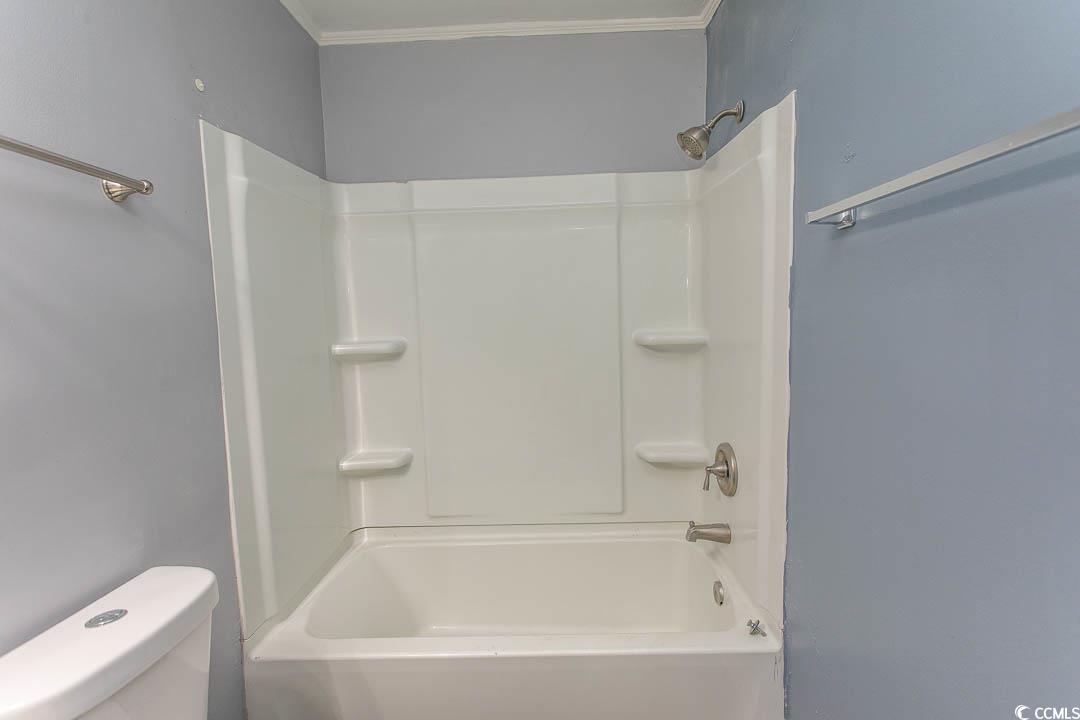 950 Forestbrook Road, Unit C3 Myrtle Beach, SC 29579 - Photo 11 of 19 Full bath with washtub / shower combination and ornamental molding