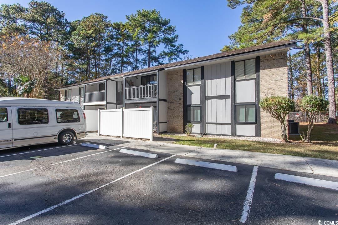 950 Forestbrook Road, Unit C3 Myrtle Beach, SC 29579 - Photo 19 of 19 View of building exterior with uncovered parking