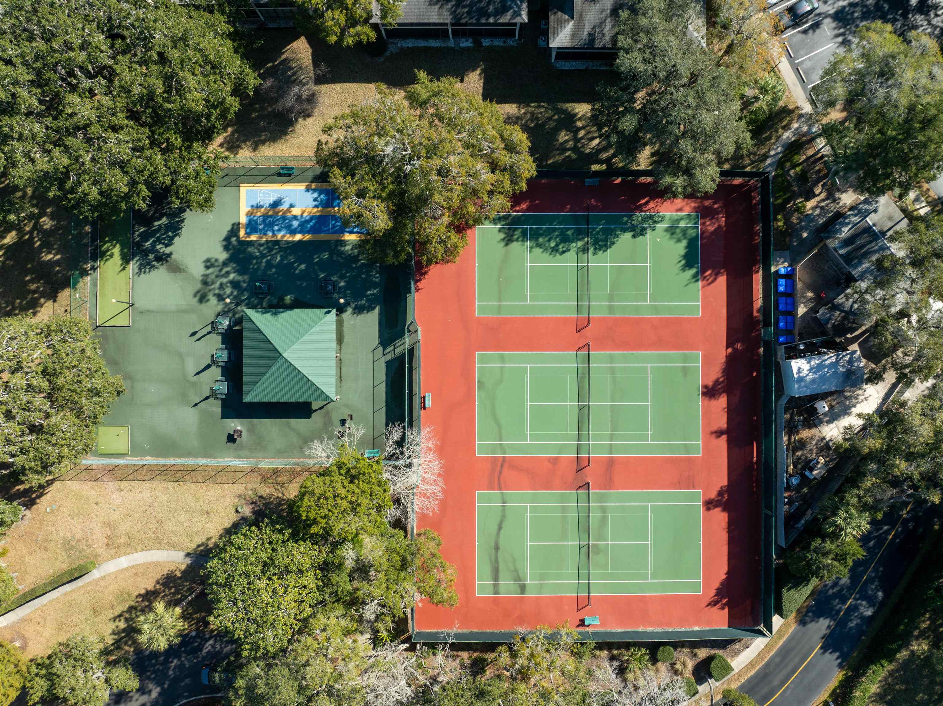 11 Tarragona Court St. Augustine, FL 32086 - Photo 17 of 33 a view of a yard with plants and a bench