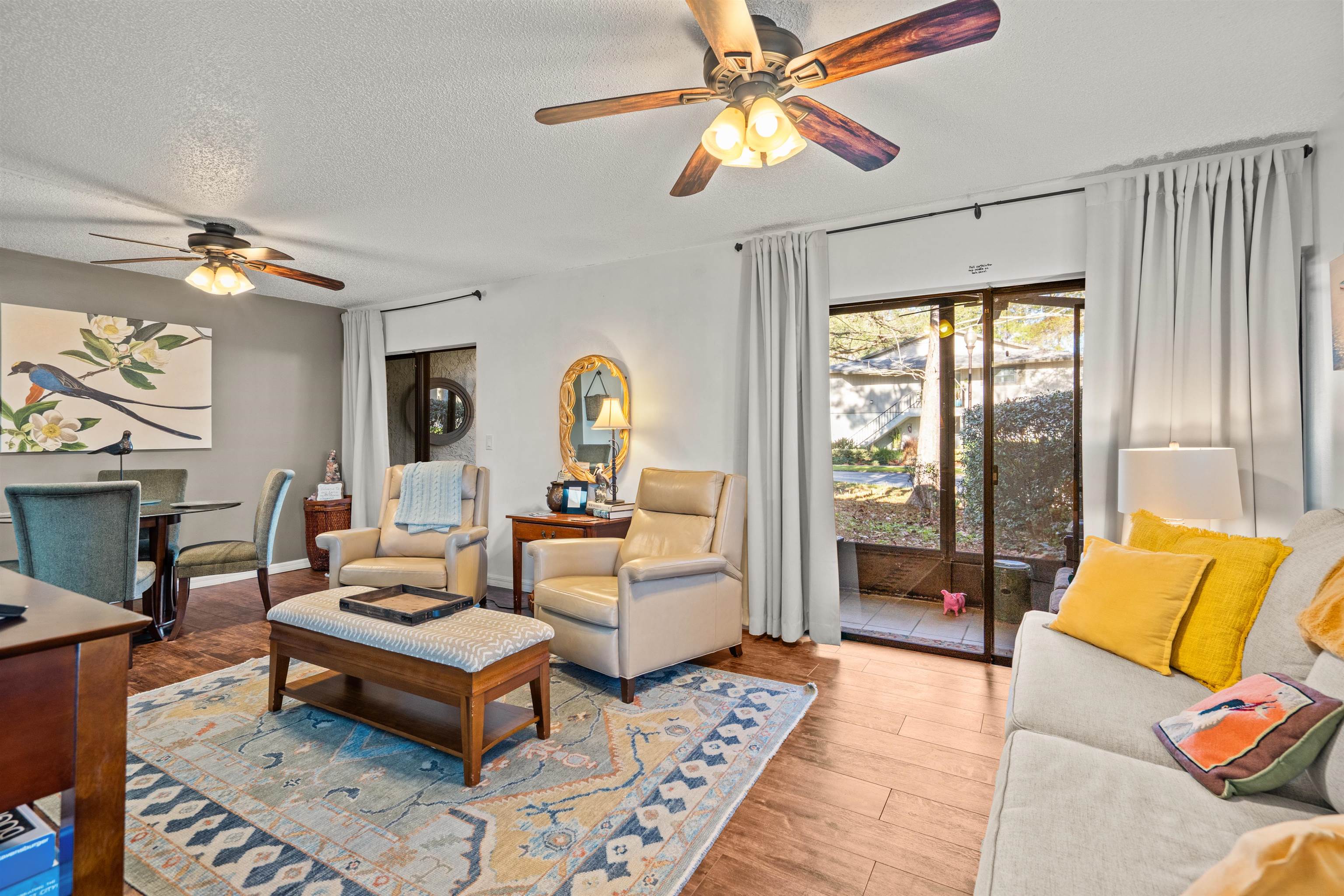 11 Tarragona Court St. Augustine, FL 32086 - Photo 25 of 33 a living room with furniture a rug and a chandelier