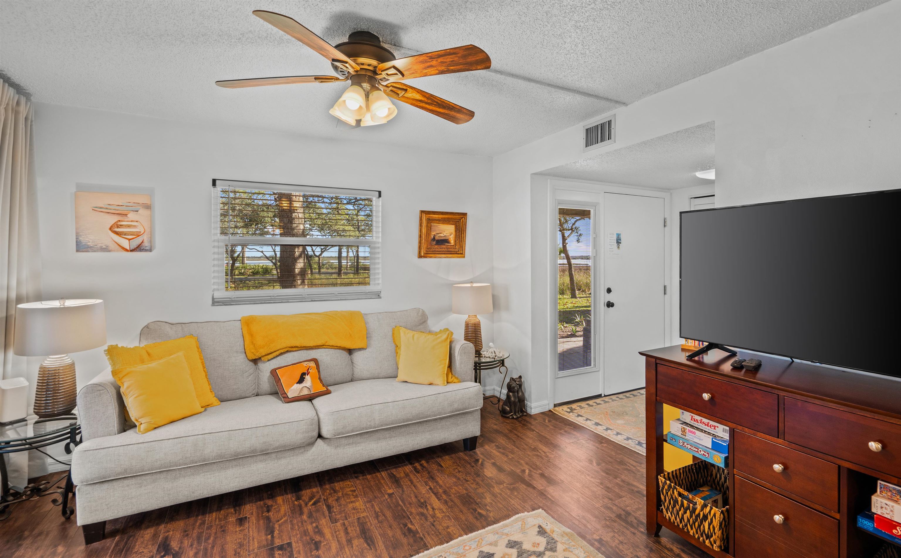 11 Tarragona Court St. Augustine, FL 32086 - Photo 26 of 33 a living room with furniture and a flat screen tv