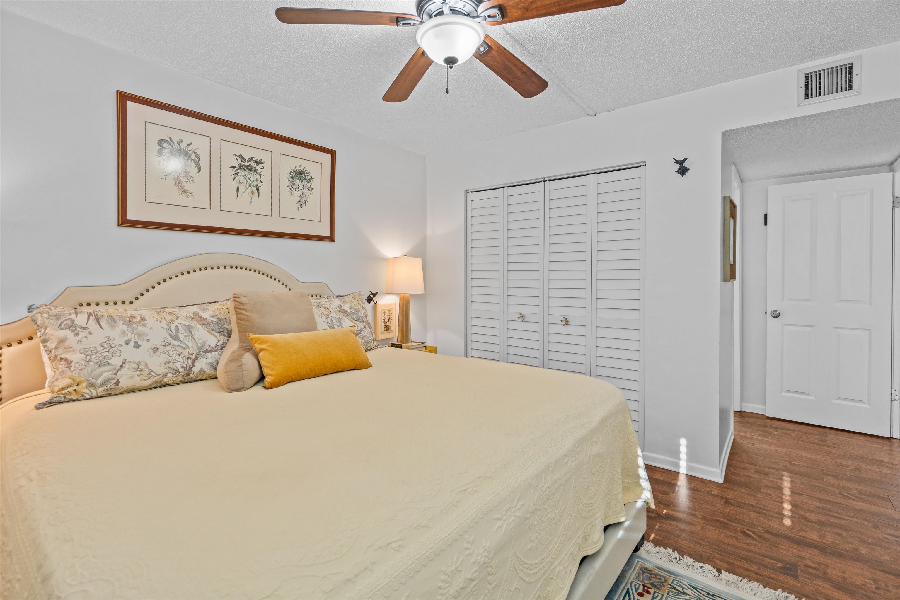 11 Tarragona Court St. Augustine, FL 32086 - Photo 3 of 33 a bedroom with a bed and wooden floor
